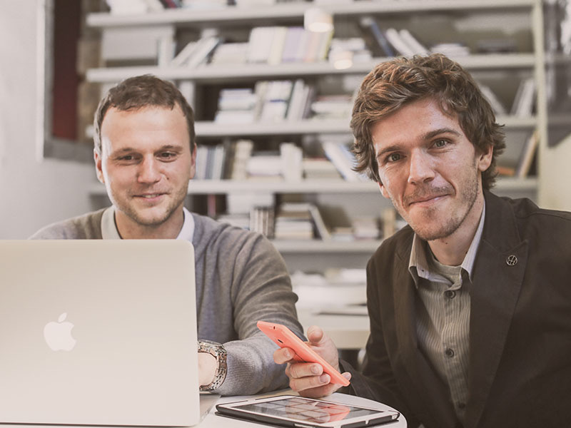Two Iuuri professionals working together