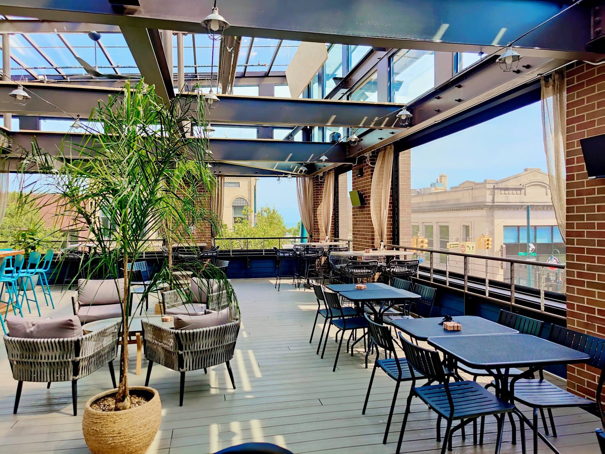 Open-air rooftop patio at an NSI-owned hospitality venue